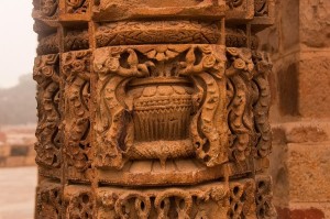 a-stone-pillar-with-beahhutiful-carvings-inside-the-qutub-minar-complex-ashish-agarwal